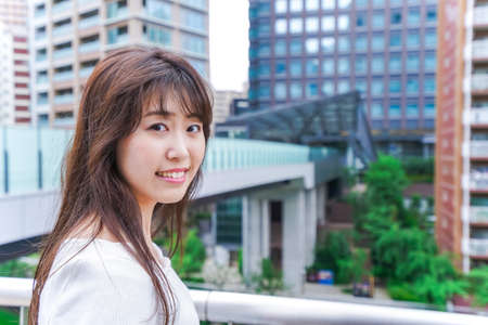 Businesswoman working in urbanの写真素材