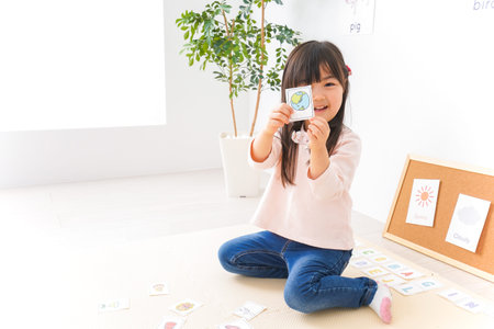 Young woman sitting on the floor in the living room.