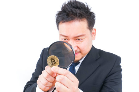 Businessman searching virtual currency