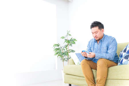 Man studying at homeの写真素材