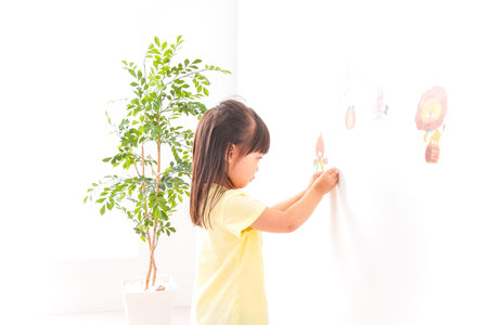 Child putting a sealの写真素材