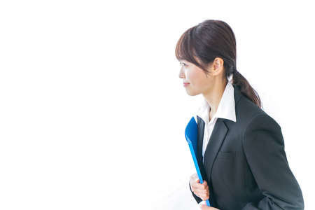 business woman bowing to someoneの写真素材