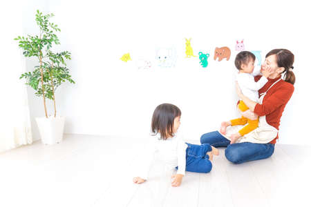 Children playing at kindergartenの写真素材