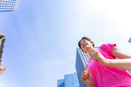 Woman running in the city