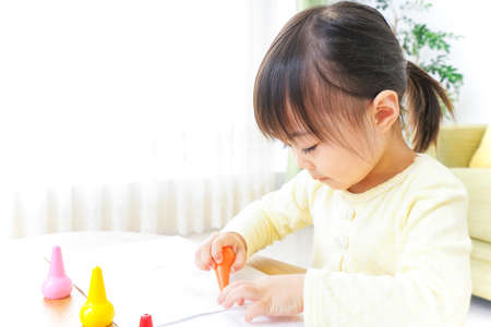 A child painting picturesの写真素材