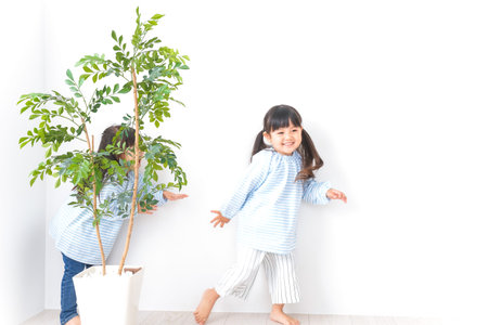 Girl playing with her friend