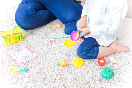 Child playing with toyの写真素材