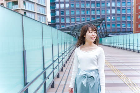 Businesswoman working in urbanの写真素材