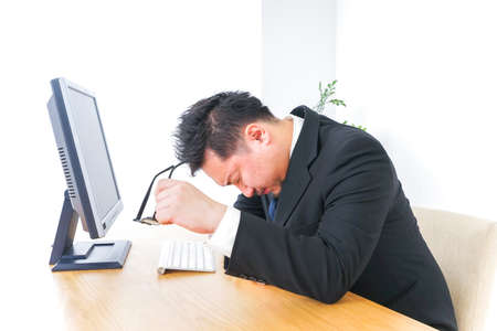 Tired businessperson imageの写真素材