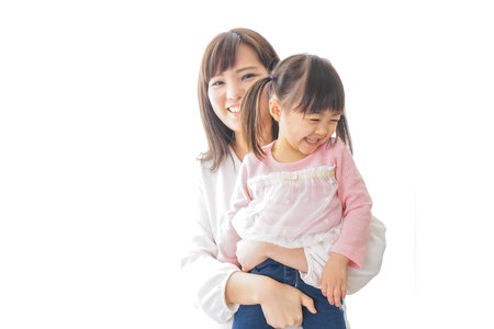 Mother having her child on her hipの写真素材