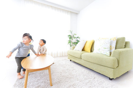 Children playing at homeの写真素材