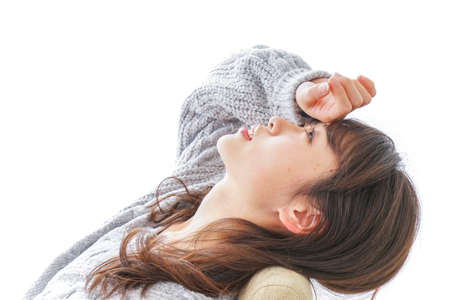 Woman developping a feverの写真素材