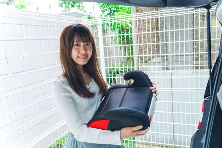 Woman having child seatの写真素材