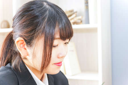 studying woman in suitの写真素材