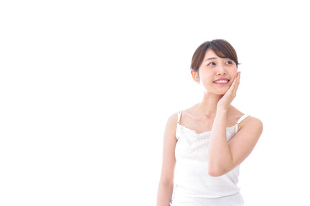 Young woman doing skin careの写真素材