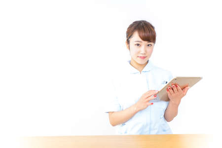 Nurse watching electronic chartの写真素材