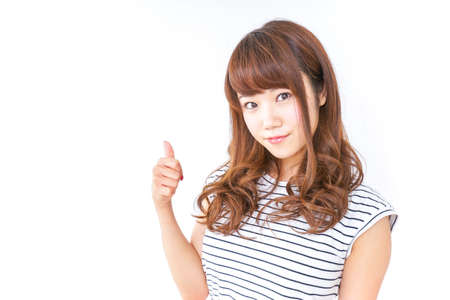 Woman pointing to somethingの写真素材