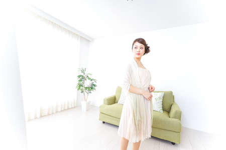 Young women changing clothesの写真素材