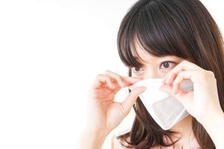 Young woman wearing a maskの写真素材