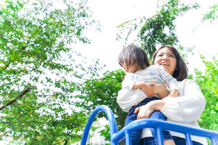 Mother hugging childの写真素材