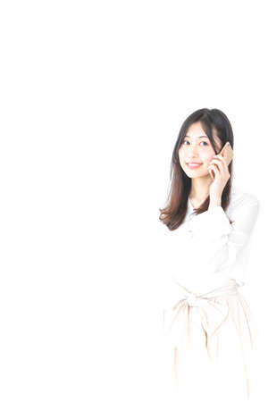 Young woman using smartphoneの写真素材