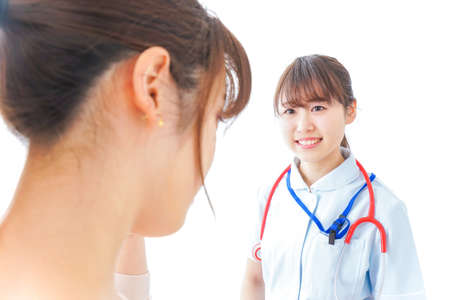 Woman receiving medical treatmentの写真素材