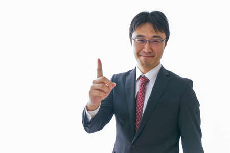 Businessman pointing to somethingの写真素材