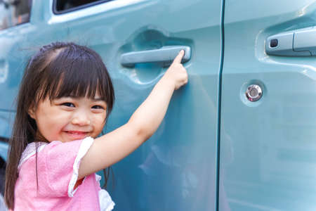 Child riding in a carの写真素材
