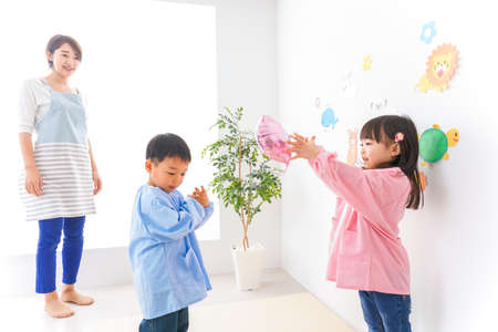Children and teacher at Kindergarten, Preschoolの写真素材