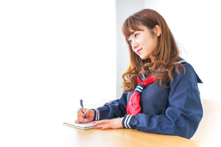 Young student with uniformの写真素材
