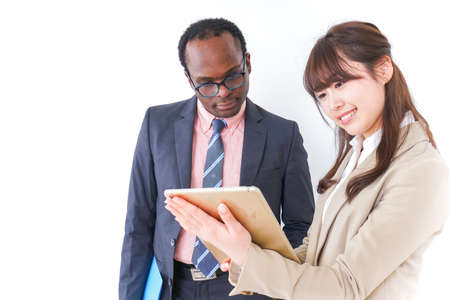 Businesspersons using a tabletの写真素材