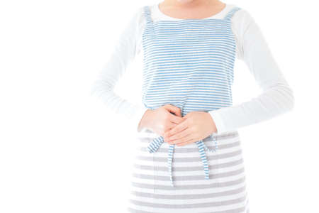 Pregnant woman taking care of her child, isolated on white backgroundの写真素材