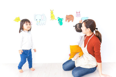 Children playing at kindergartenの写真素材