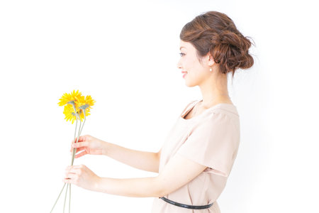 woman having flowersの写真素材
