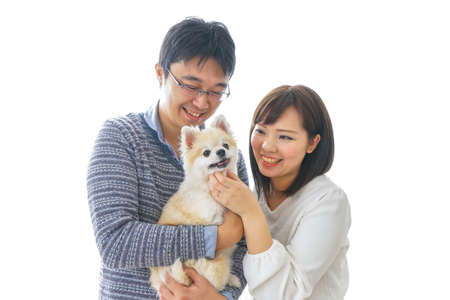 Couple having a dogの写真素材