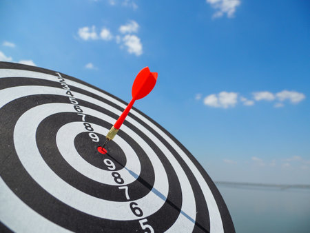 success target business darts red target in the center background is a large seaの写真素材