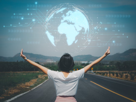 Global network connection in human hand Woman raising her hand showing the connection of technology from around the world energy savingの写真素材