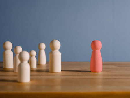 Selection of different personnel The red wooden man stands out from the crowd. leadership different concept concept of human resource managementの写真素材