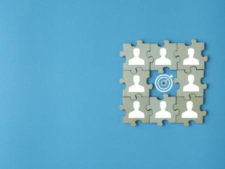 Businessmen or teams with the same business goals Working together as a team adds to the same goal. on a blue background wooden puzzleの写真素材