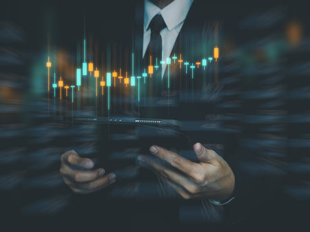 stock market investment ideas business people using Tablet to analyse financial graphs profits digitally.の写真素材