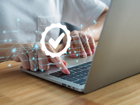 Businessman working with laptop computer showing Symbol of the leading service ISO Certification Document Management System, product standard auditing. Quality Control Standardsの写真素材
