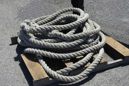Used rope of a ship at the pierの写真素材