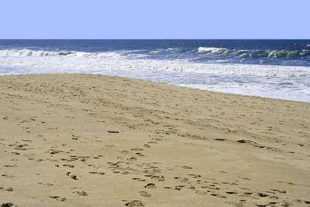 A beach with waves comingの写真素材