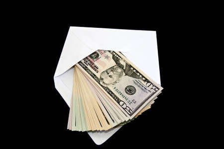 50 Dollars coming out of an envelopeの写真素材