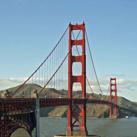 Square shot of the Golden Gate Bridge with blue skyの写真素材