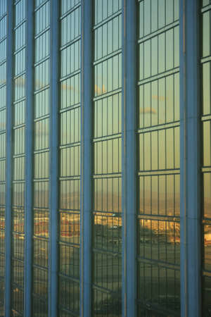 A reflection during sunset in a facadeの写真素材