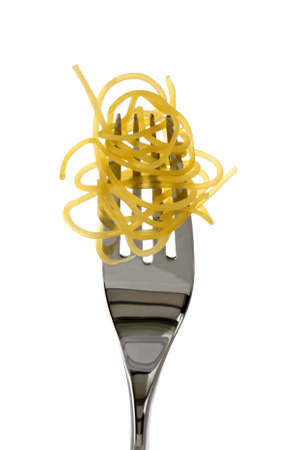 Spaghetti on a upright fork without sauce or decorationの写真素材