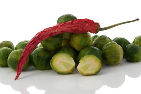 Fresh brussels sprout and dried red chileの写真素材