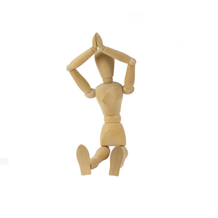 Wooden female figure is doing yogaの写真素材