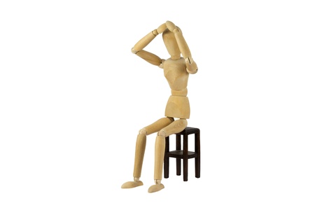 A wooden female doll in desperationの写真素材